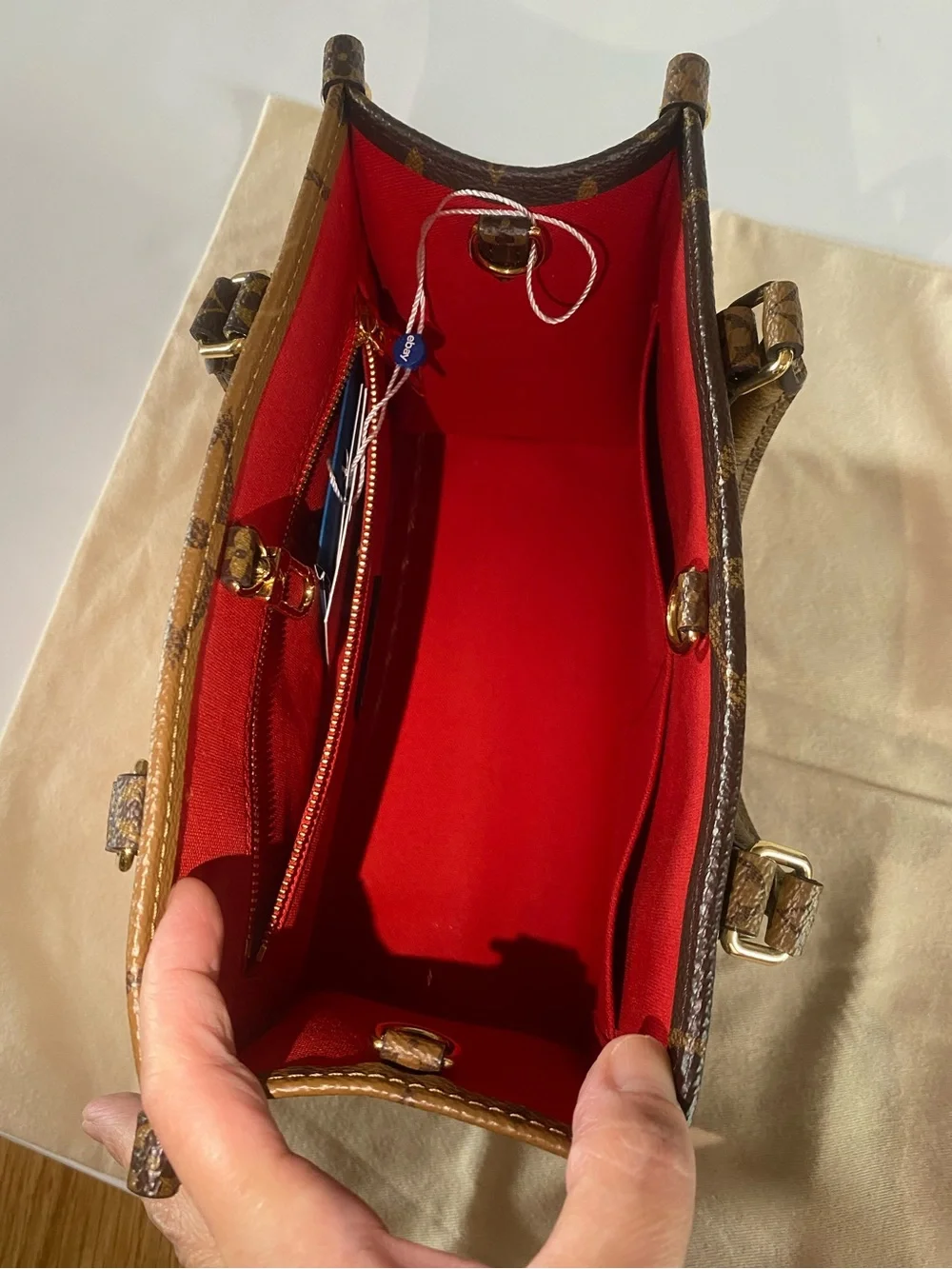 Louis Vuitton onthego PM reverse
